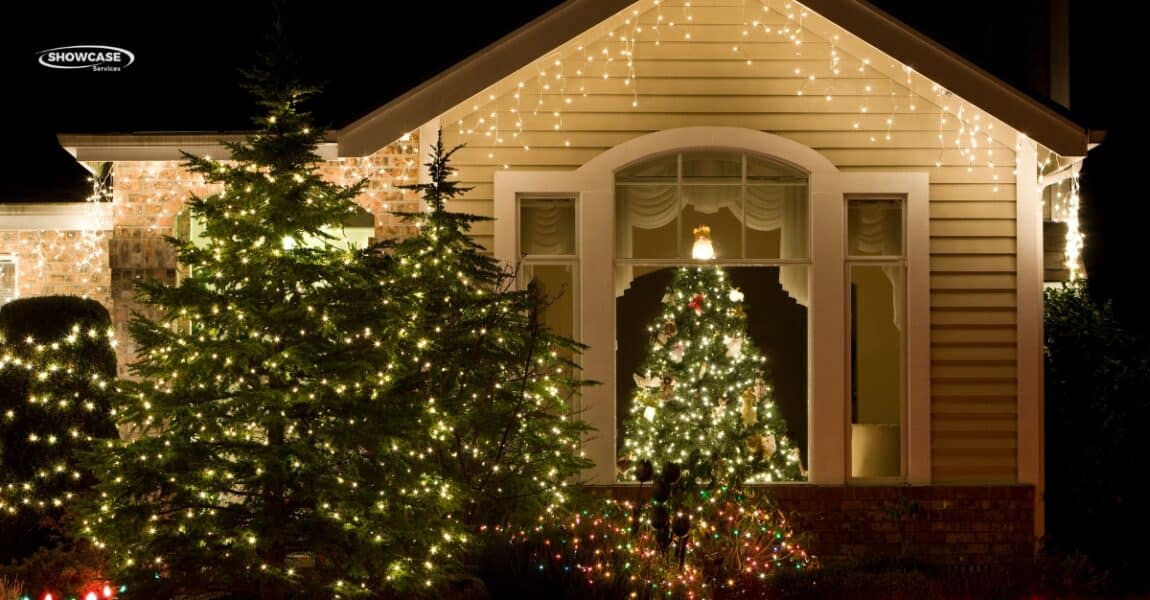 Professional holiday light installer decorating a Minnesota home